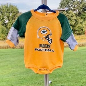 NFL: Packers, 6-9 months, long sleeved onesie.